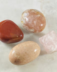 Red Jasper palm stone by Sarah Belle to block electromagnetic stress and radiation.